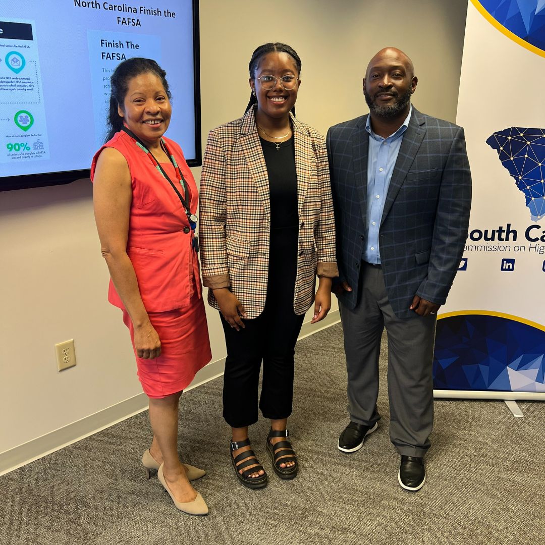 Kerrigan Clark photographed with Dr. Karen Woodfaulk, Director, Office of Student Affairs and Dr. Gerrick Hampton, Associate Director, Office of Student Affairs