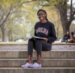 Student reading a book.